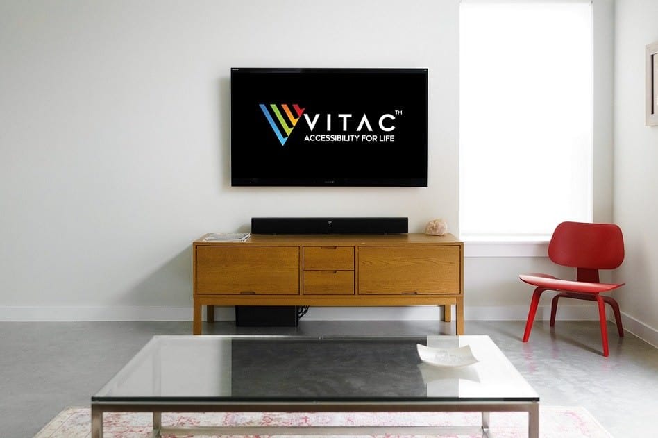 Television set showing VITAC's Logo