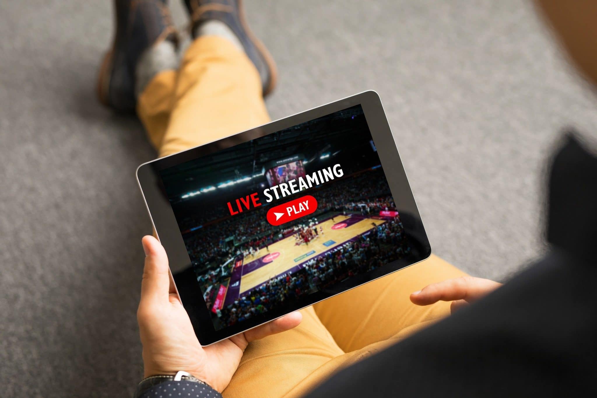 man-watching-sports-on-live-streaming-online-service