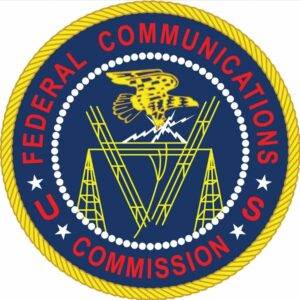 FCC seal, a blue circle with Federal Communications Commission written around the outside