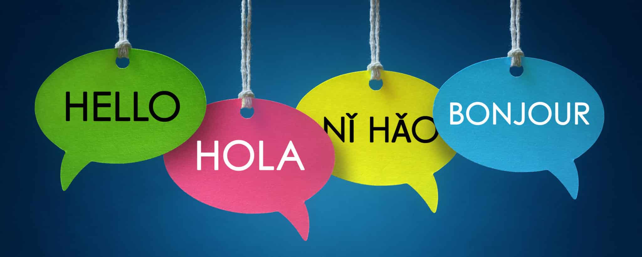 Signs with multi-lingual expressions for hello