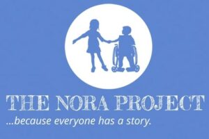 Logo for the Nora Project showing two children, one using a wheelchair, holding hands.