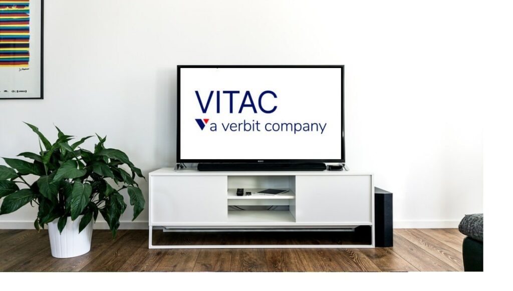 VITAC logo (VITAC, a Verbit Company) displayed on a television set.