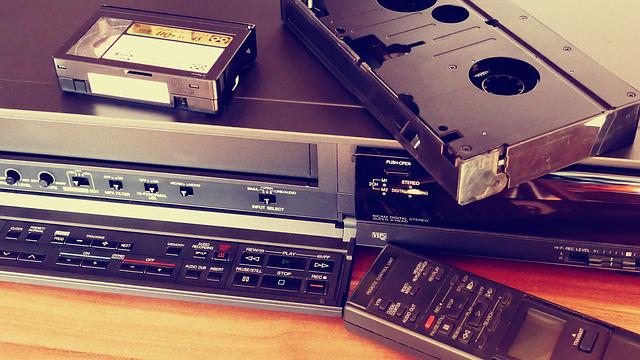 old video formats, VHS tape and VCR player with remote