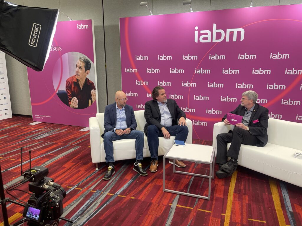 Yair Amsterdam and Doug Karlovits are seated on a couch for an IABM TV interview